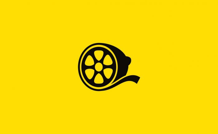 Lemon Press logo, black on yellow background. A silhouetted lemon cross-section that also appears as a film reel with celluloid unspawling away from the lemon.
