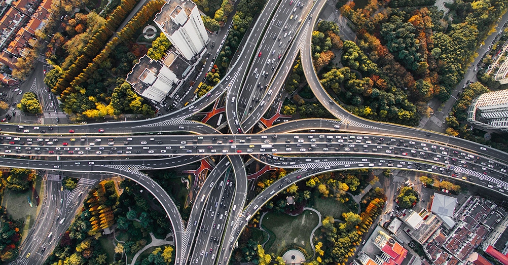 Bird-eye view of a motorway intersection.